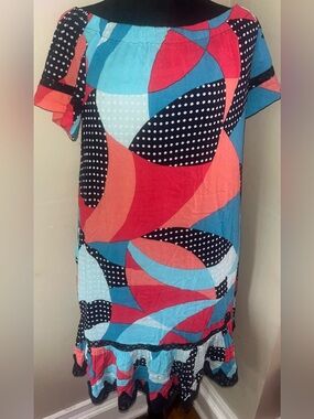 NWT Karri Blue dress in crepe material geometric pattern inlaid accents Size S.